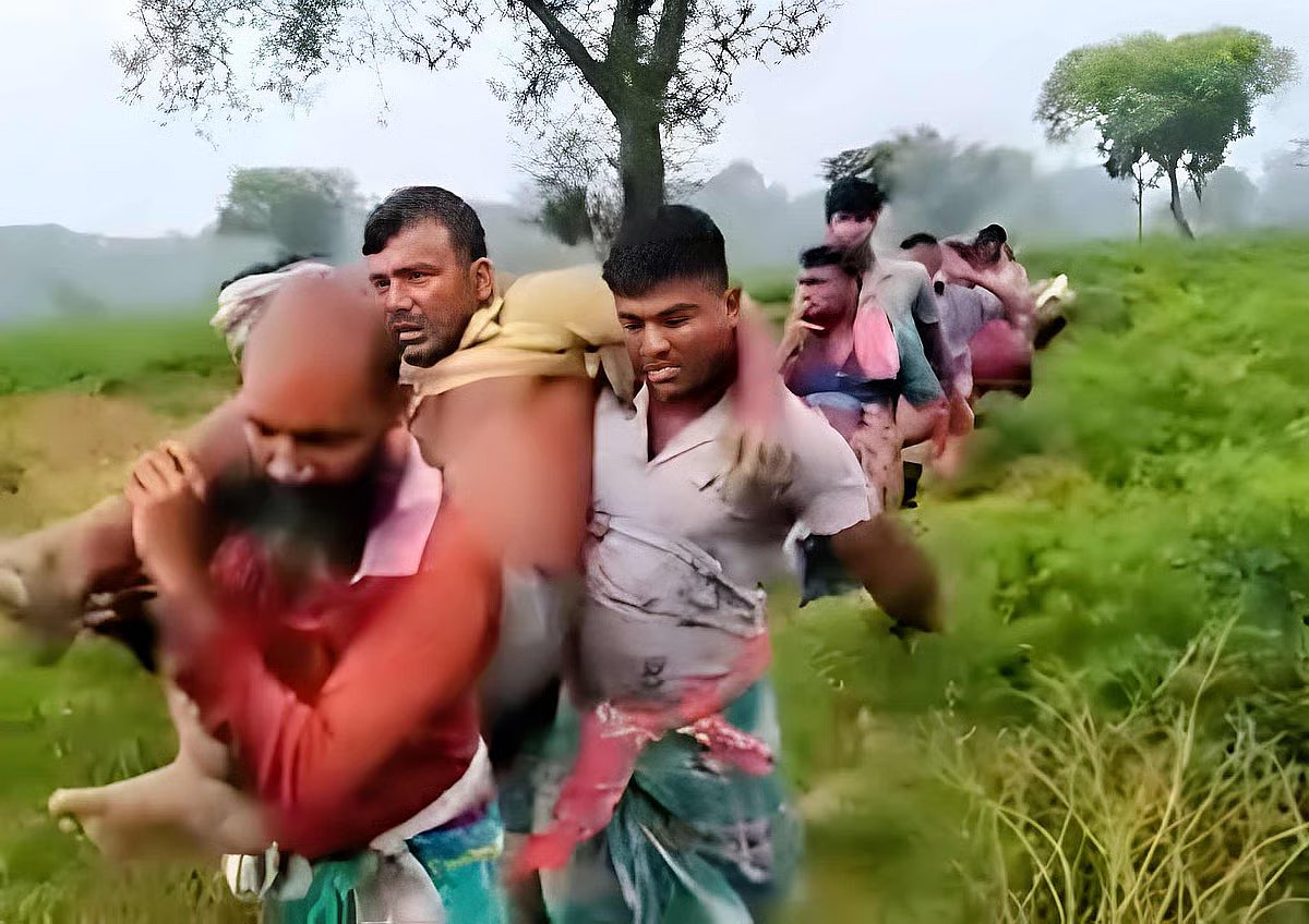 Local residents carry the farmer, who was shot by the BSF on the Daulatpur border in Kushtia, to hospital on 10 October 2026 morning after rescuing him near the border in the upazila.