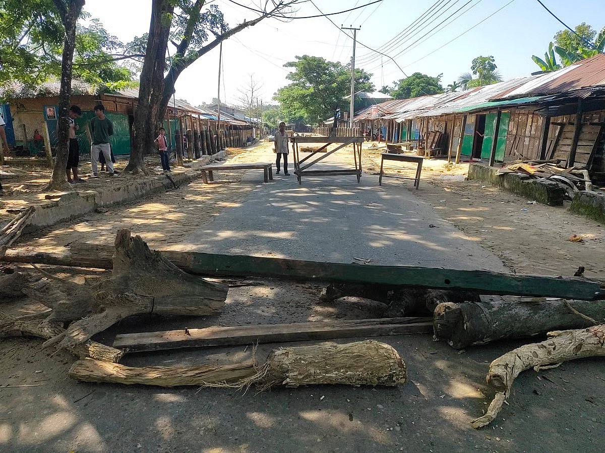 Protesters place tree trunks across the road in Ujo Bazar area of Sajek on 11 October 2026