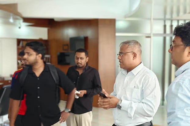 Chhatra Dal leaders enter the vice-chancellor’s office with him. On the left is Biplob Hossain, organising secretary of the university unit, with Joint General Secretary Abu Sufian Al Sabit behind him. Photo taken on 12 October 2026.
