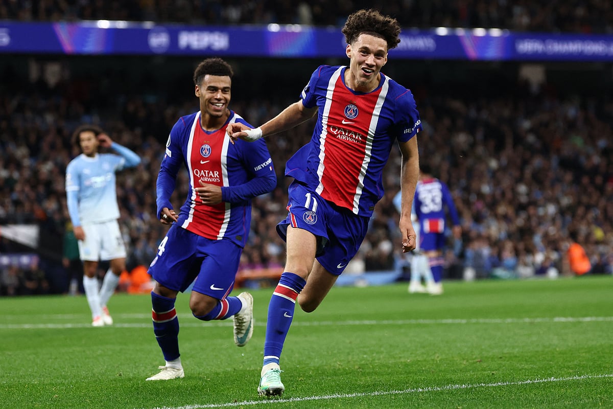 Paris Saint-Germain’s French midfielder #11 Maghnes Akliouche celebrates after scoring their fourth goal during the UEFA Champions League, league phase football match between Manchester City and Paris Saint Germain at the Etihad Stadium in Manchester, north west England, on 14 October 2026