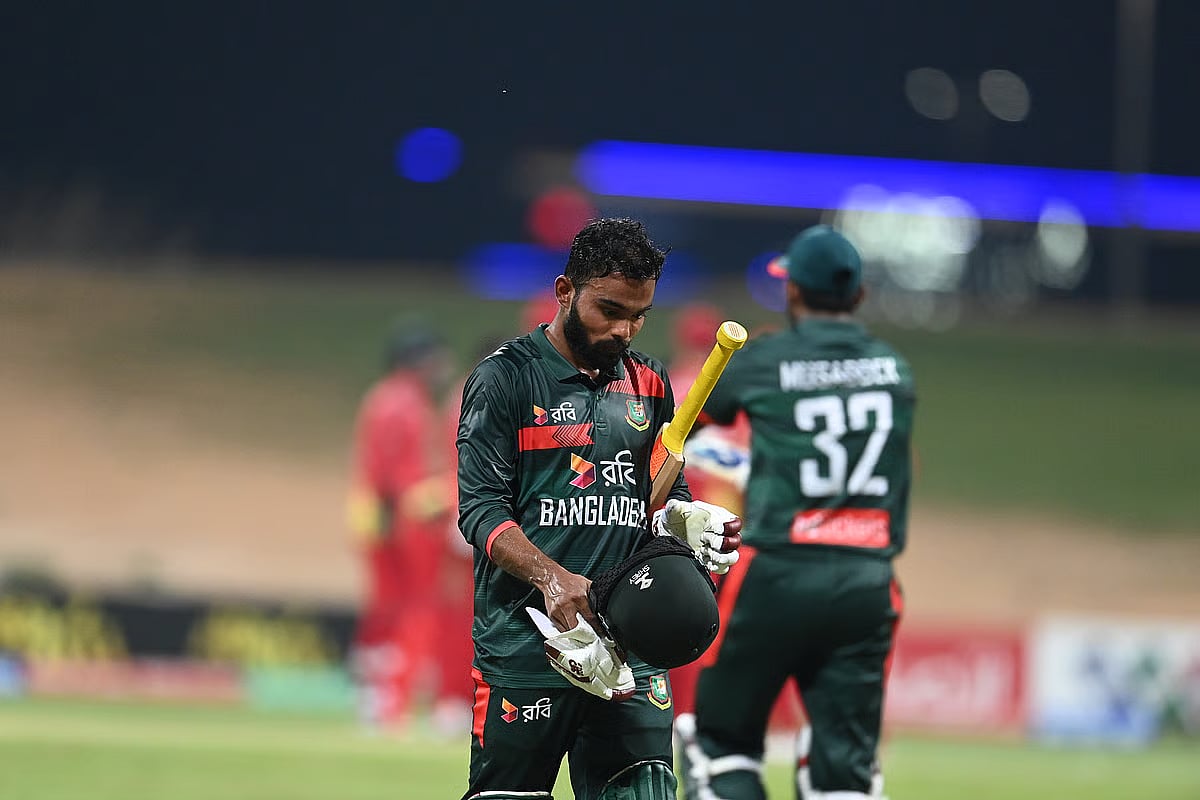 Towhid Hridoy walks back to the dressing room in disappointment.
