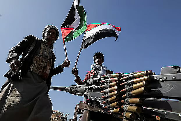 Armed Houthi fighters