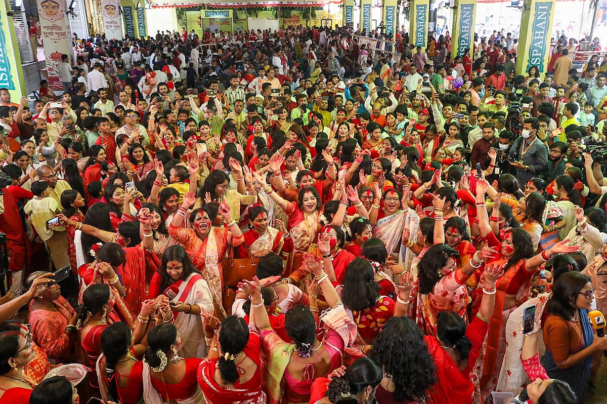 Devotees mark Bijoya Dashami of Durga Puja with vermilion and joined in the traditional Sindur khela at Dhakeshwari National Temple in Dhaka on 21 October 2026