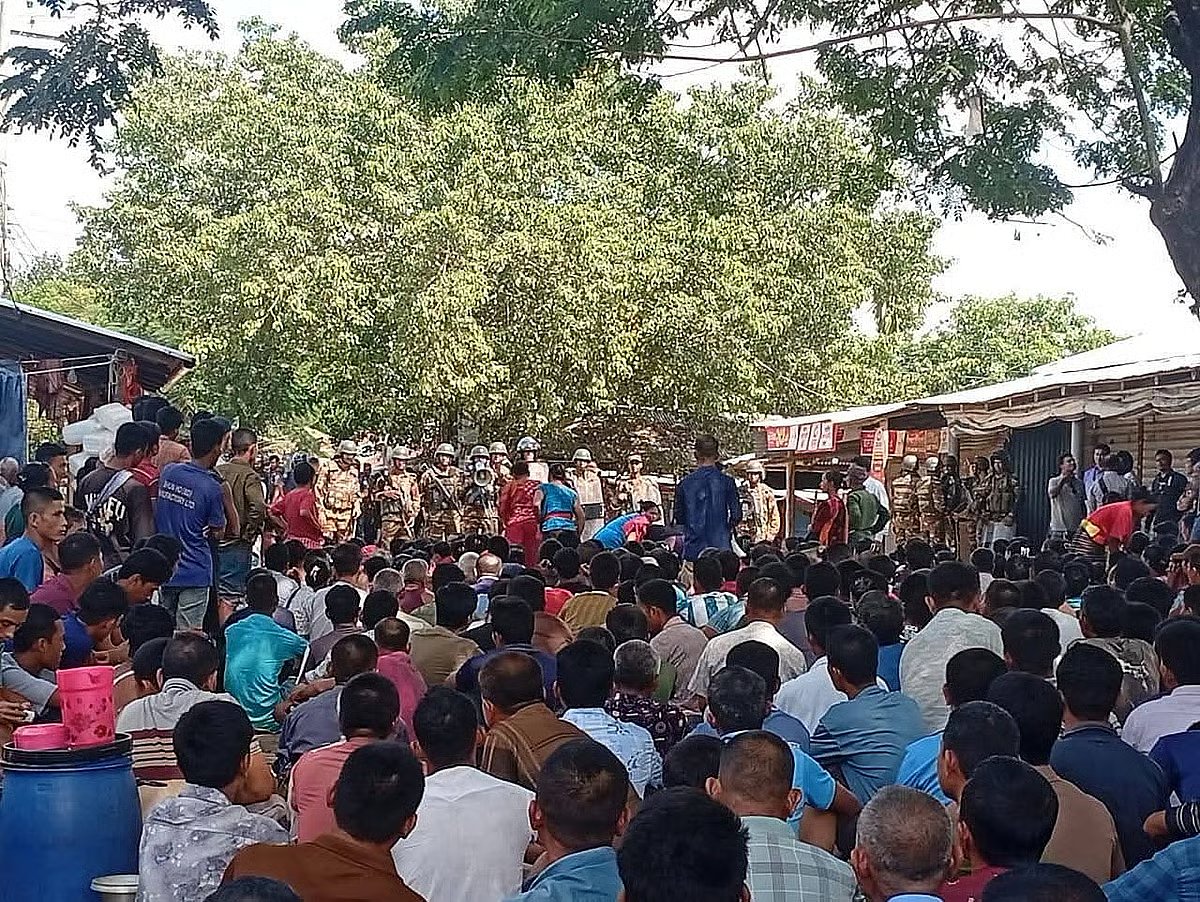 Protesters face law enforcement personnel in Ujo Bazar, Sajek, Baghaichhari, Rangamati. The photo was taken on the morning of 22 October 2026.