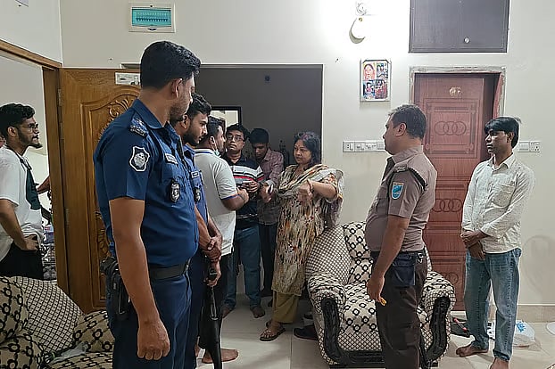 A daring burglary has taken place in a flat on the second floor of a seven-story building in the Sebasangha area of Narsingdi city. Upon receiving the news, police went to the scene. Photo taken Friday night.