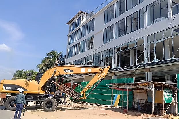 A resort building was demolished during an eviction operation on Cox's Bazar's Marine Drive Road. The photo was taken in the afternoon on Monday.