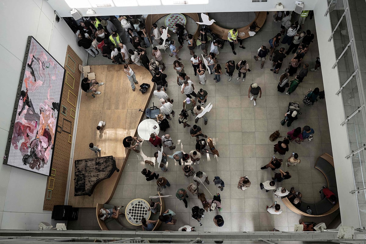 Voters gather at a polling station to cast their ballots in Tel Aviv on October 27, 2026, during Israel's legislative election.