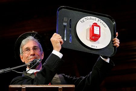 Abrahams, Master of ceremonies and editor of the Annals of Improbable Research, holds a prize at the 24th First Annual Ig Nobel Prizes awards ceremony at Harvard University in Cambridge. Photo: Reuters