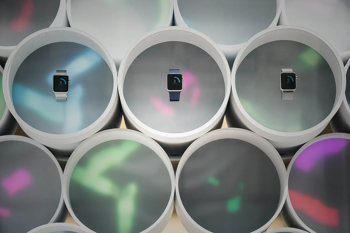Apple Watches are displayed in the window of an Apple store in Hong Kong on 24 April 2015.