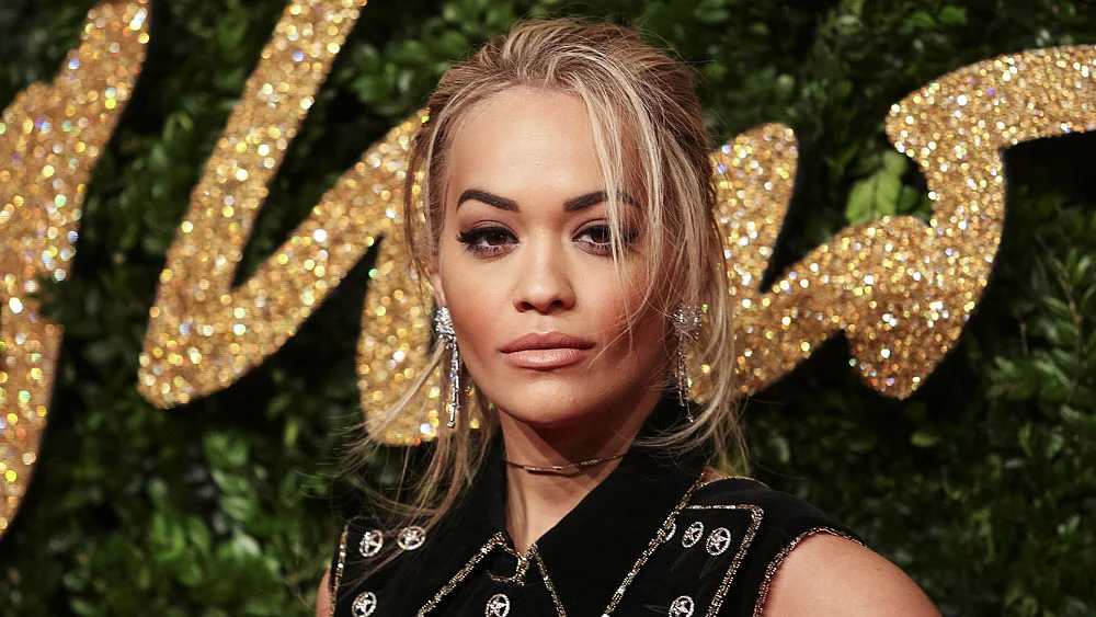 British singer Rita Ora poses for pictures on the red carpet upon arrival to attend the British Fashion Awards 2015 in London on November 23, 2015. Photo: AFP