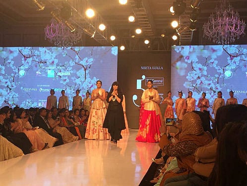 A fashion show in Dhaka displays a fusion of East and West