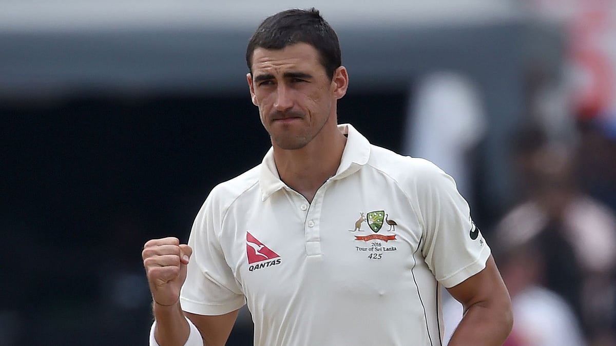 Australian cricketer Mitchell Starc celebrates after he dismissed Sri Lankan batsman Dinesh Chandimal during the second day of the third and final Test match between Sri Lanka and Australia at The Sinhalese Sports Club (SSC) Ground in Colombo on August 14, 2016.
