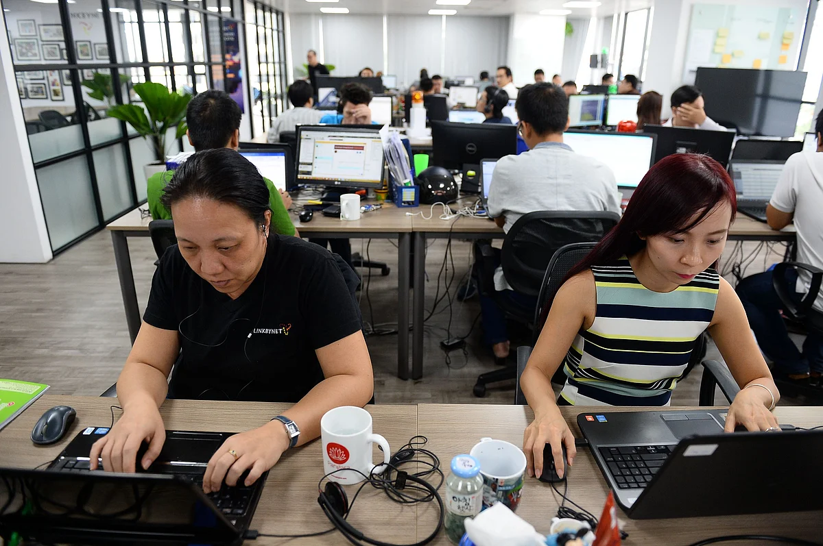 This picture taken on 5 September, 2016 shows employees working inside the French IT company Linkbynet in Ho Chi Minh City. Photo: AFP      Vietnam's 'Silicon Valley' sparks startup boom AFP . Ho Chi Minh City   Recent Vietnamese graduate looking for an English-language teacher? There’s an app for that. Or hunting the best bowl of pho in your Hanoi neighbourhood? There’s now an app for that, too. A decade ago such technology would likely have been developed in California’s Silicon Valley. But today those apps are being churned out by Vietnam’s startup sector—an industry driven by local techies trained overseas but returning home to prowl for opportunities. The sector’s growth in a young tech-hungry nation has caught the eye of foreign firms—President Francois Hollande on Wednesday visited French tech firm Linkbynet in Ho Chi Minh City, the communist country’s startup hub. Much of the technology, which also includes popular mobile games and e-commerce software, is being produced for local consumers in Vietnam, where the median age is 30 and internet connectivity is rapidly expanding. “The local market is large, young, fast-growing, and not fully tapped,” said Eddie Thai of 500 Startups, a venture with a $10 million pot—mostly of foreign cash—to splurge on tech enterprises for Vietnamese users or made by local developers. US-born Thai, 31, whose parents left during the Vietnam War, belongs to a vanguard of entrepreneurs who have arrived to offer expertise in the country, where Intel and Samsung already have a foothold in the hardware industry. •	Homegrown talent - “I kept getting tugged by Vietnam, I saw that the opportunity to make an impact and make money doing it were bigger the sooner I came back,” he told AFP. For Thai, the mathematics made the move a no-brainer: 90 million people, 45 million internet users, 30 million smartphone users and internet usage 10 times what it was a decade ago. He arrived in 2012 to work for a corporate firm, and eventually joined 500 Startups, which has funded ventures including the language learning app Elsa and online ticketing platform Ticketbox. Other apps developed in Vietnam include Lozi for food lovers and mobile bespoke tailor UKYS, which are not connected to Thai’s firm. But much of the talent is also homegrown: Vietnamese teens rank ahead of peers in the United States, Britain and Sweden in maths and science, according to the latest survey from the Organisation for Economic Cooperation and Development in 2012. That educated labour force, which comes cheap compared with China or Singapore, is helping to pique interest from tech heavyweights like Google CEO Sundar Pichai, who took time away from his holiday in December to speak to tech entrepreneurs in Hanoi. Comprehensive official figures are not available. But state media reported turnover in the software and IT services industry was $3 billion last year, from $2 billion in 2010, citing the Vietnam software and IT services association. The government has also outlined its own strategy for the sector, and founded Vietnam Silicon Valley in 2013 to create an “ecosystem of innovations and technology commercialisation”. Hollande applauded the industry during his visit to IT service provider Linkbynet, which was founded in a garage in France. “What strikes me is the global character... it’s Vietnam but it’s a global environment, with global clients,” he said. •	Growing pains - But some observers say investors should be wary of the hype, warning of red tape and murky local laws. “Vietnam has hidden tech potential, but it could take another five years maybe really to create these huge massive companies that have global influence,” said Anh-Minh Do of Singapore-based Vertex Venture Holdings. “The law needs to be better, the government needs to be more supportive, there needs to be more interaction from Vietnamese-Americans, specifically Vietnamese-Californians because of the ‘Valley’ connection.” While Vietnam’s startup sector is smaller than early entrants such as Indonesia and Malaysia, there is hope the country is fast evolving from export industries such as garments or commodities like coffee. “Vietnam has been present in the tech sector for several years but now it is moving up the value chain,” said Romain Caillaud, Southeast Asia director for US company FTI Consulting. “The sector is growing because Vietnam is making strategic moves in terms of competitive advantages to attract foreign investment.” Thai conceded the road is sometimes rocky, but he is optimistic Vietnam’s startup culture will overcome growing pains to see substantial progress, even if it is a few years off. “Generally speaking, Vietnam is moving one step back occasionally, but two steps forward. Hopefully in the next five or 10 years it will get better.”