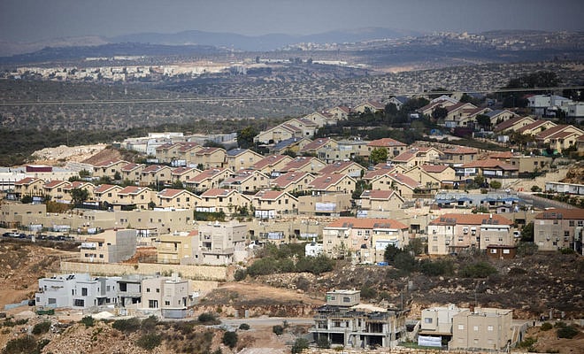 An Israeli committee called off a discussion set for Wednesday on issuing permits for hundreds of new settler homes in defiance of a UN vote demanding a halt to such activity, an NGO and reports said.