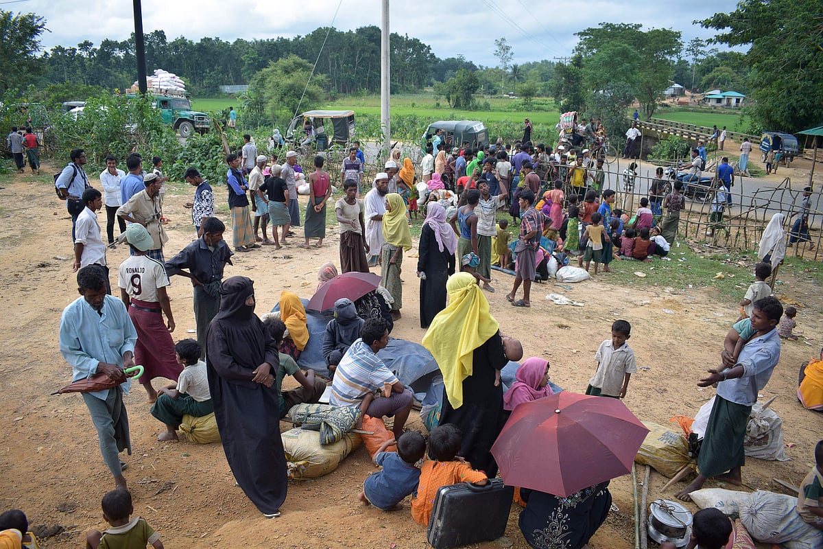 This 29 August, 2017 photo shows Rohingya refugees rest at Kutupalong refugee camp along the Bangladesh-Myanmar border near the Bangladeshi town of Ukhiya