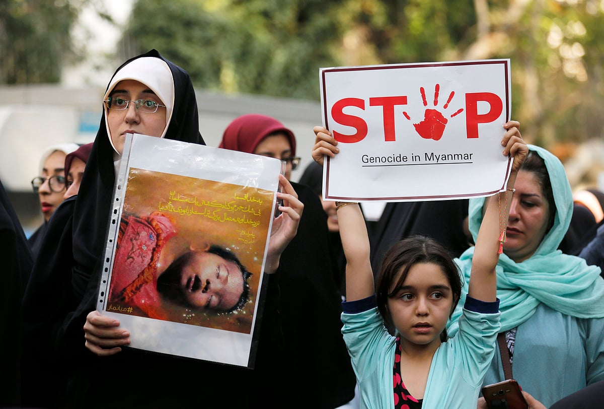Iranians take part in a protest against violence in Myanmar in front of the United Nations office in Tehran on September 10, 2017. Iran's foreign minister Mohammad Javad Zarif has written to the UN calling for action on the Myanmar's Muslim minority while his spokesman said Iran's efforts to send aid had been blocked by Myanmar. Zarif raised concerns on the 'atrocities committed against' the Rohingya Muslim community in a letter to the United Nation's Secretary General Antonio Guterres. AFP