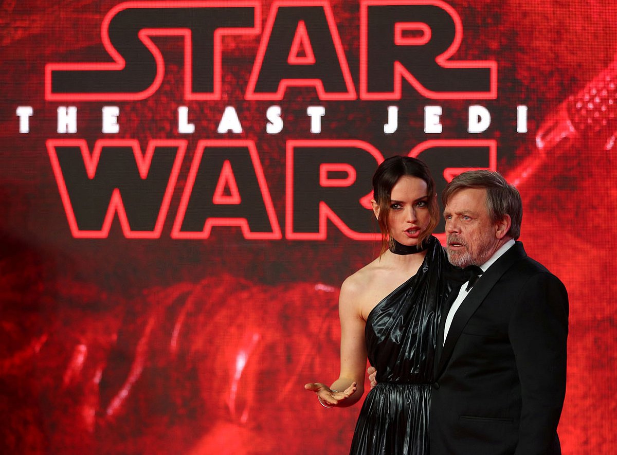 Actors Daisy Ridley and Mark Hamill pose for photographers as they arrive for the European Premiere of `Star Wars: The Last Jedi`. Photo: Reuters