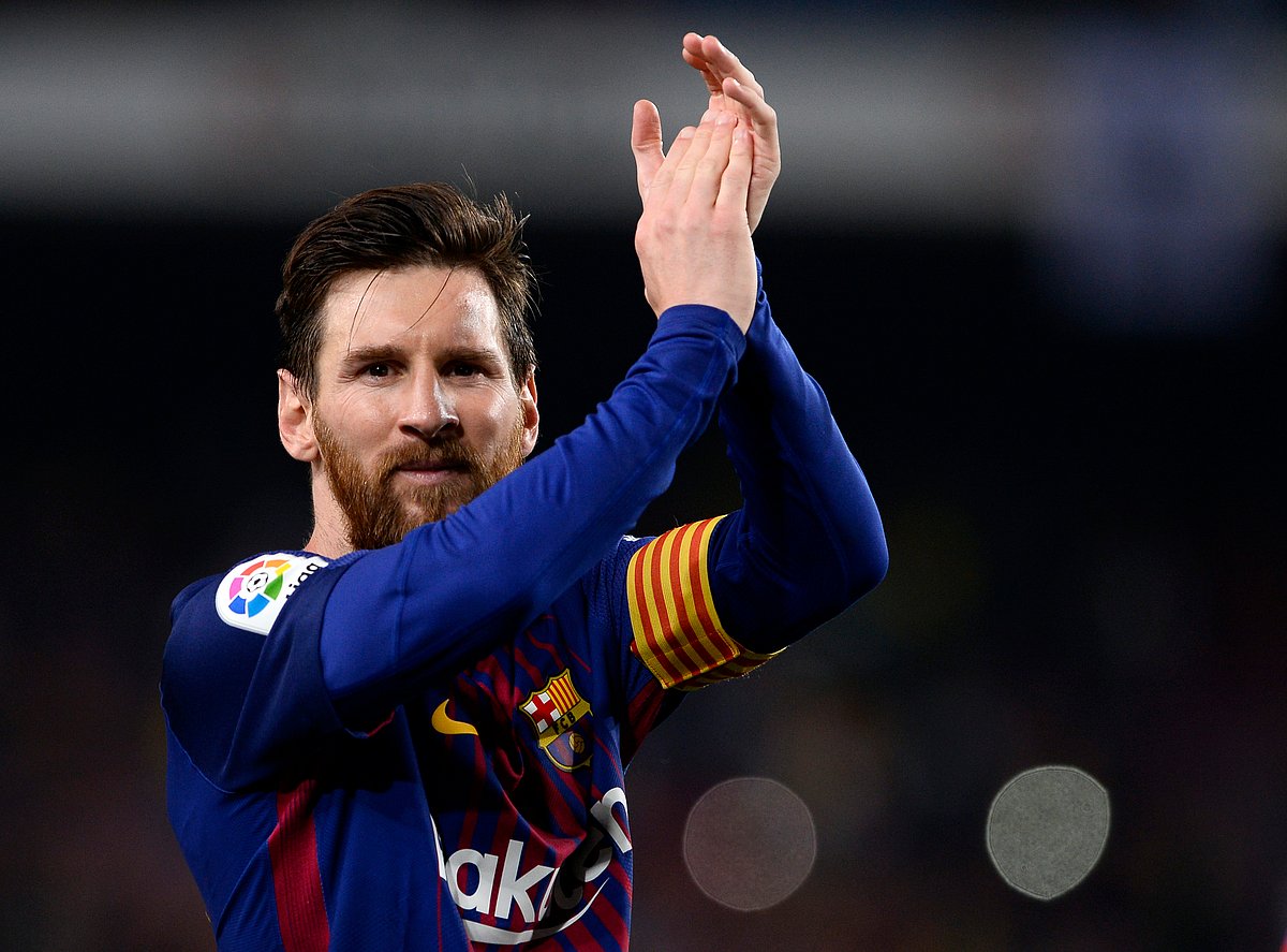 Barcelona`s Argentinian forward Lionel Messi celebrates at the end of the Spanish league football match between FC Barcelona and Real Madrid CF at the Camp Nou stadium in Barcelona on 6 May, 2018. Photo: AFP