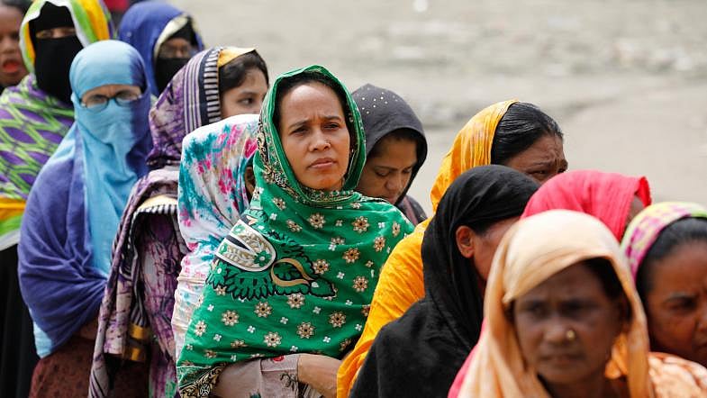 A section of women voters wait to cast their votes in the Gazipur City Corporation polls at Auchpara Government Primary School on 26 June.