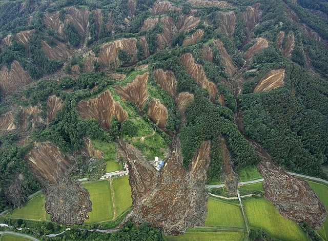 Landslides caused by an earthquake are seen in Atsuma town, Hokkaido, northern Japan, in this photo taken by Kyodo on 7 September 2018.
