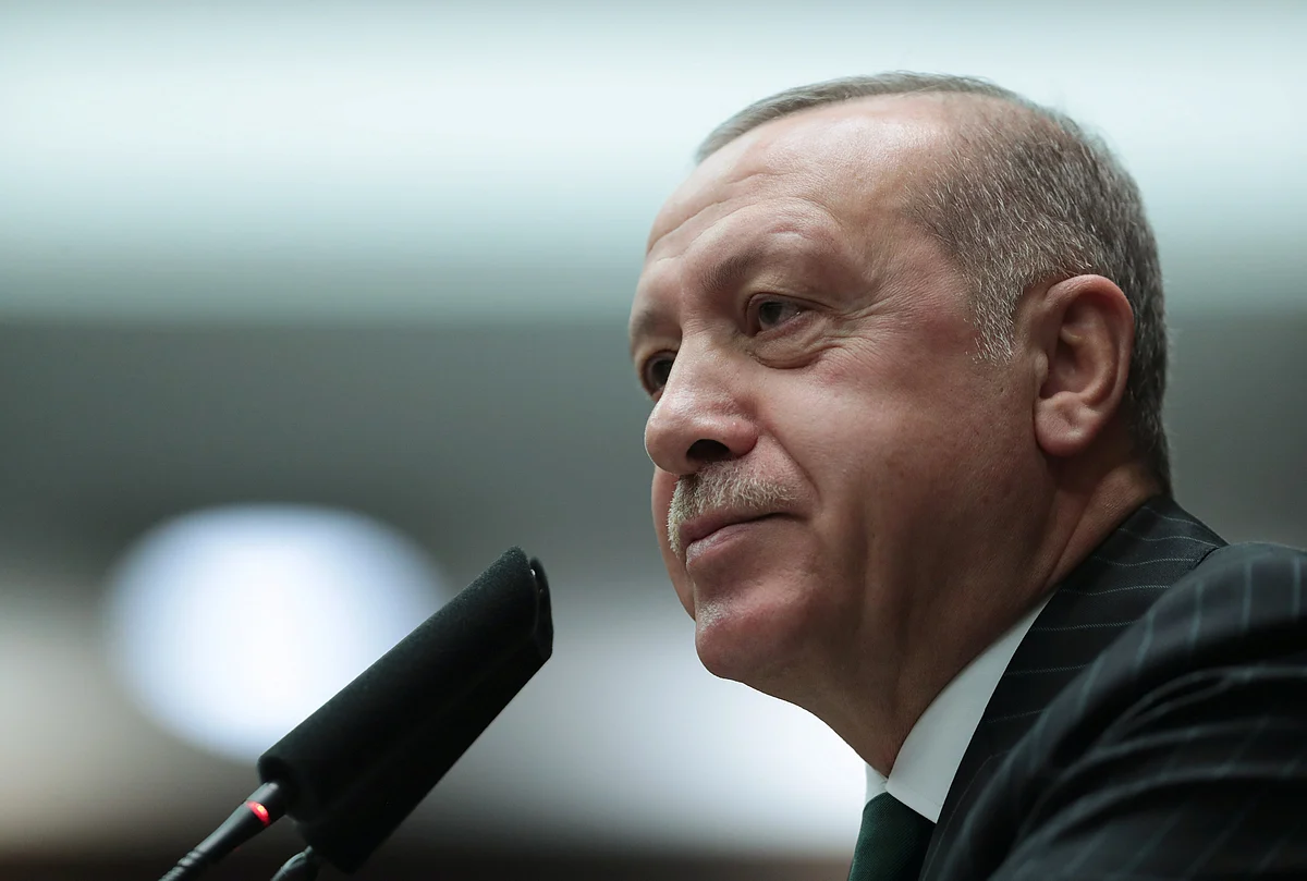 Turkish president Tayyip Erdogan addresses members of parliament from his ruling AK Party (AKP) during a meeting at the Turkish parliament in Ankara, Turkey, 20 November 2018.