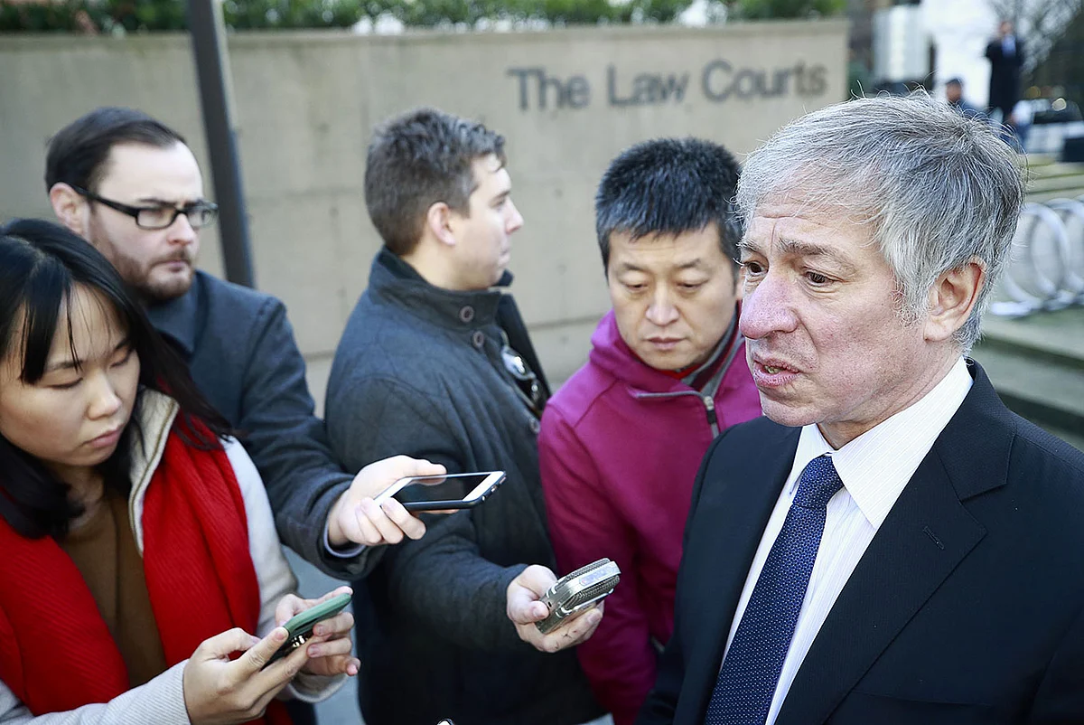 Immigration lawyer Richard Kurland (R) is interviewed by media outside the BC Supreme Courthouse at the bail hearing for Huawei Technologies chief financial officer Meng Wanzhou on 7 December in Vancouver, Canada. Photo: AFP