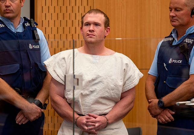 In this picture taken on 16 March 2019, Brenton Tarrant (C), the man charged in relation to the Christchurch massacre, stands in the dock during his appearance at the Christchurch District Court.