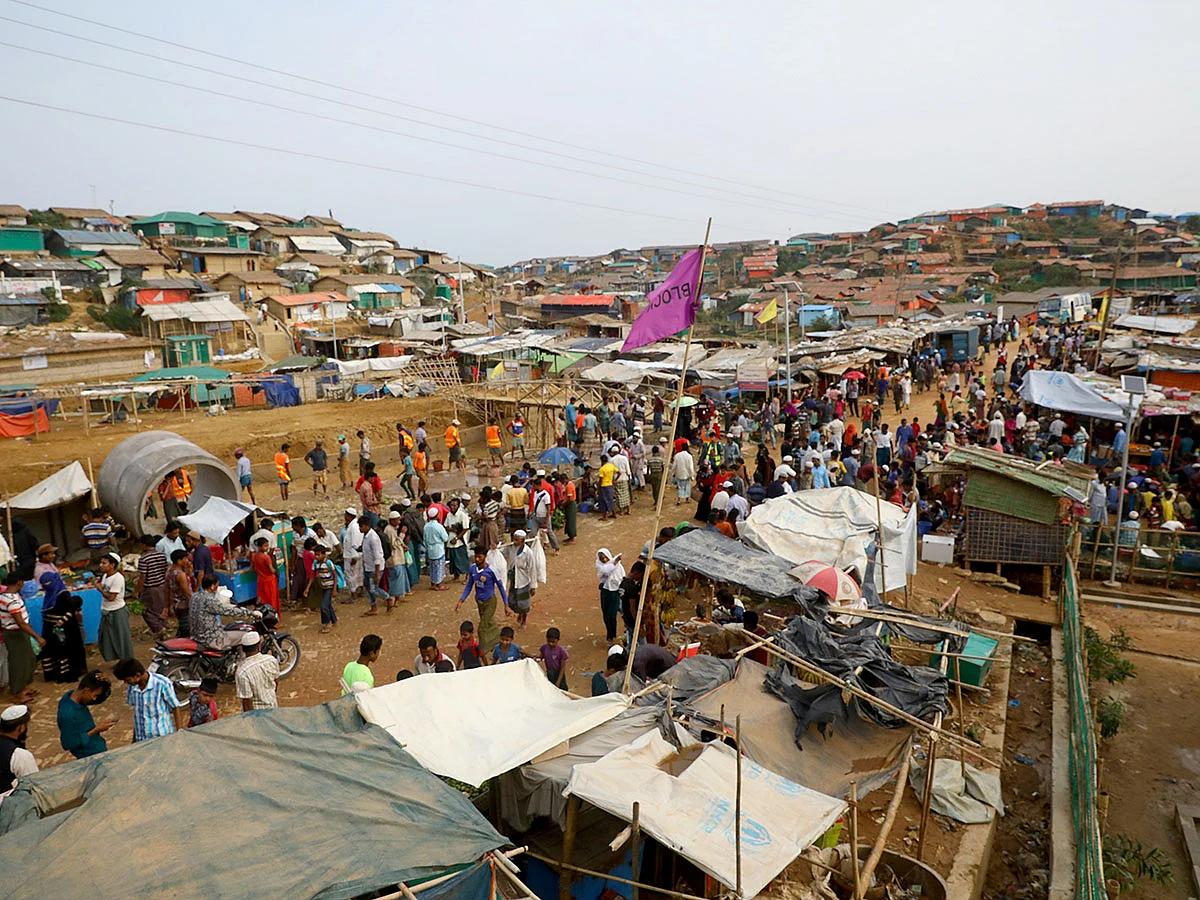 Rohingya refugees gather at a market inside a refugee camp in Cox's Bazar, Bangladesh, on 7 March 2019